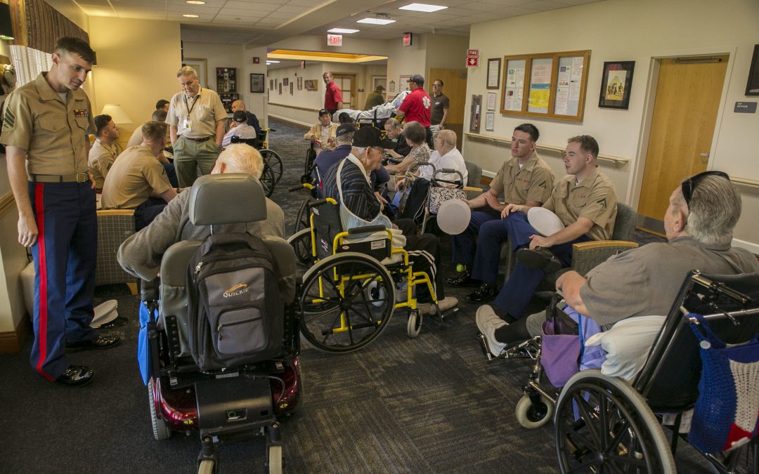 U.S. Marines visiting residents of Alexander Nininger State Veterans’ Nursing Home. (Photo courtesy of Sgt. James Smith)